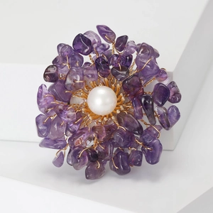 Handmade flower brooch with purple natural stones, white pearl and gold wire detailing