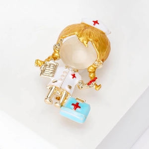 Broche infirmière en métal doré avec émail coloré et pierre œil de chat pour manteau