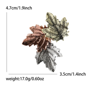 Vintage maple leaf brooch in gold silver and bronze tones with detailed dimensions