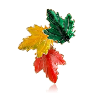 Vintage maple leaf brooch with three colors of enamel drip oil and golden alloy plating