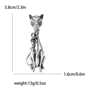 Vintage silver cat brooch for coats with dimensions 5.8cm height and 1.6cm width