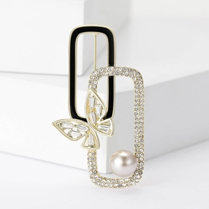 Elegant butterfly pearl brooch with black enamel and zircons on white geometric blocks