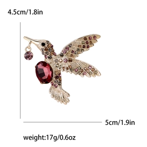 Broche colibri élégante avec strass colorés et dimensions indiquant 4,5 cm de largeur