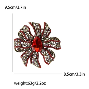 Elegant hollow flower brooch with red rhinestones and vintage gold plating for women