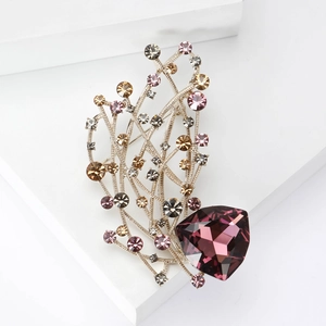 Broche élégante en forme de fleur avec un grand cristal violet et des strass colorés