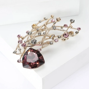 Broche élégante en forme de branche avec gemme violette et cristaux colorés