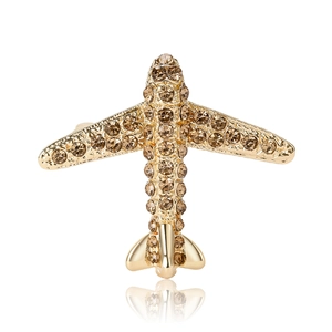 Élégante broche avion dorée avec strass champagne pour tailleurs et robes femmes