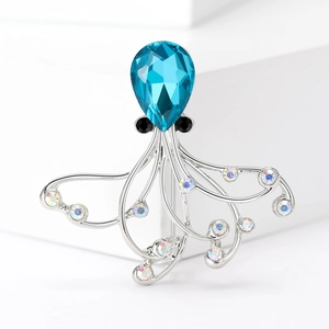 Exquisite Oktopus-Brosche mit blauem Kristall und schimmernden silbernen Tentakeln