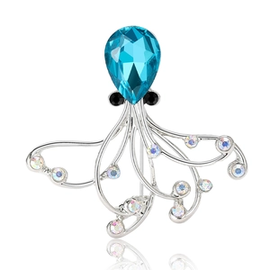 Exquisite Oktopus-Brosche mit großem blauem Kristall und funkelnden Strasssteinen