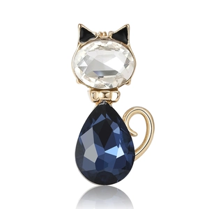 Elegante spilla a gatto con cristallo blu a goccia e dettaglio coda dorata a ricciolo