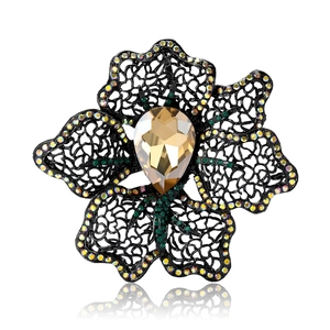 Elegant hollow floral brooch with champagne pear-cut crystal and colorful rhinestones
