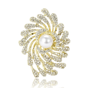 Elegant gold flower brooch with central pearl and radiant rhinestone fireworks design