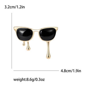Creative enamel sunglasses brooch in gold and black with dimensions and weight measurements
