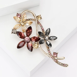 Détails de la broche fleur en cristal avec strass champagne et roses sur support doré