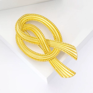 Vintage French style gold metal knot brooch with twisted rope texture for women suits