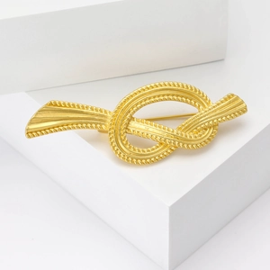 French vintage matte gold rope knot brooch with elegant textured finish for women