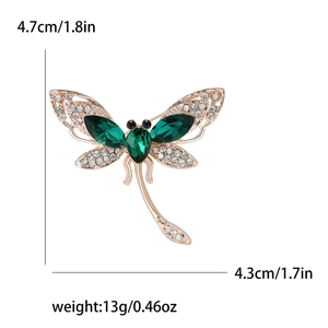Elegant dragonfly brooch with olive green gemstones and rhinestones in rose gold alloy