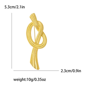 French vintage matte gold knot brooch with linear texture for elegant suits and dresses