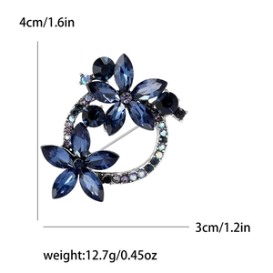 Elegant silver alloy brooch featuring deep blue crystal flowers and purple rhinestones