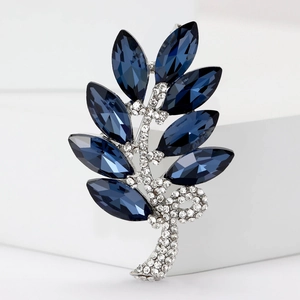 Broche élégante en cristal en forme de feuille avec pierres bleu marine et strass blancs