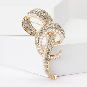 Elegante goldene Schleifenbrosche mit Strasssteinen und Perlen für Damenanzüge