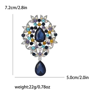 Vintage alloy rhinestone brooch with blue pear-shaped pendant, size 7.2cm x 5.0cm