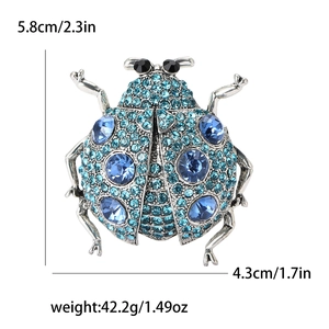 Détails de la broche coccinelle dimensions 5,8cm de hauteur avec strass en cristal bleu