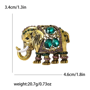 Vintage olifant broche met smaragd en roze kristallen in goudkleurige afwerking