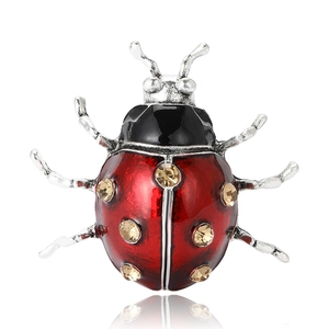 Broche coccinelle chic en émail rouge et noir avec strass champagne scintillants