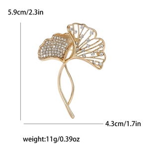 Elegant gold ginkgo leaf brooch with crystals, measuring 5.9cm in height and 4.3cm in width