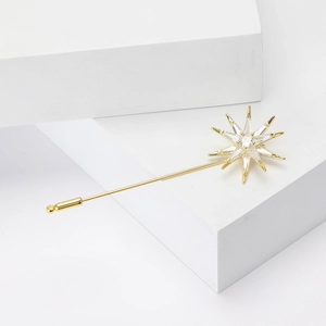 Elegant gold-tone eight-pointed star pin brooch with micro-pave cubic zirconia crystals