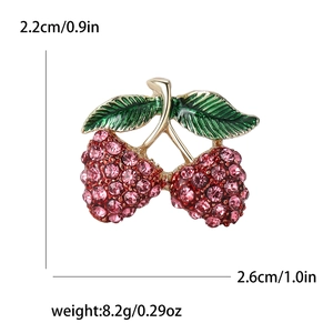 Spilla fragola scintillante con strass, foglia di smalto verde e cristalli