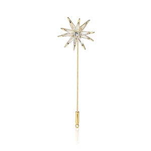 Elegant gold eight-point star brooch with cubic zirconia on a long needle pin