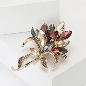 Vintage floral bouquet brooch with champagne and burgundy crystals on a gold alloy base