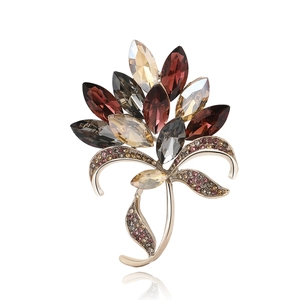 Elegant vintage floral brooch with wine red crystals and rhinestones on gold base