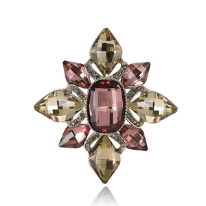Vintage Baroque starburst brooch with purple and champagne rhinestones in silver finish