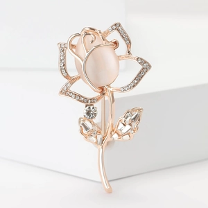 Elegant rose gold tulip brooch with pink cat eye stone and sparkling rhinestones