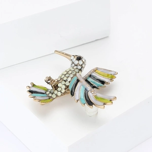 Broche colibri élégante avec strass colorés et émail pour costumes de femmes chic