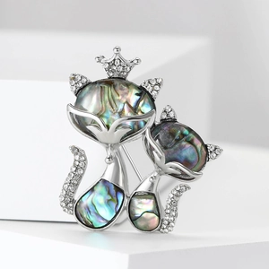 Vintage alloy fox brooch with abalone shell inlays and sparkling white crystals
