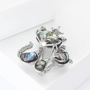 Vintage silver alloy fox brooch featuring colorful abalone shell and crystal stones