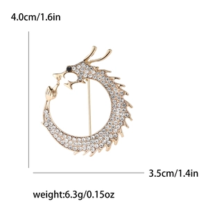 Detail showing the 4.0cm height and 3.5cm width dimensions of this dragon brooch