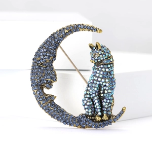 Exquisite crescent moon and cat brooch with blue rhinestones in retro gold finish