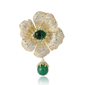 Elegant begonia flower brooch with green gemstones and zircon pavé in gold finish