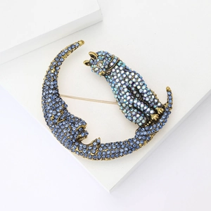Elegant gold alloy moon cat brooch with sparkling blue rhinestones for women clothing