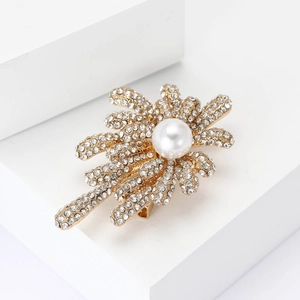 Elegant gold fireworks brooch with sparkling rhinestones and a white faux pearl for suits