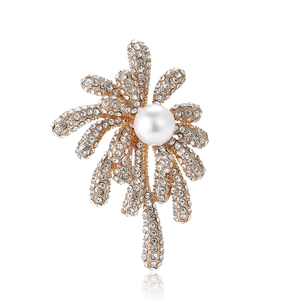 Elegant gold-tone firework brooch with sparkling rhinestones and a central white pearl