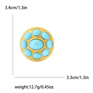 Detail view of retro alloy rhinestone brooch with turquoise beads, size 3.4x3.3cm