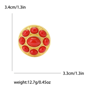 Vintage gold Turkish round brooch with red gemstones measuring 3.4cm in height