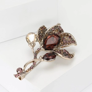 Vintage calla lily brooch with dark red crystals and rhinestones on bronze alloy base