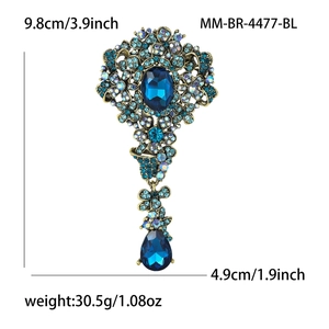 Spilla vintage dorata con strass blu e pendente a goccia per abiti da sera e cerimonie